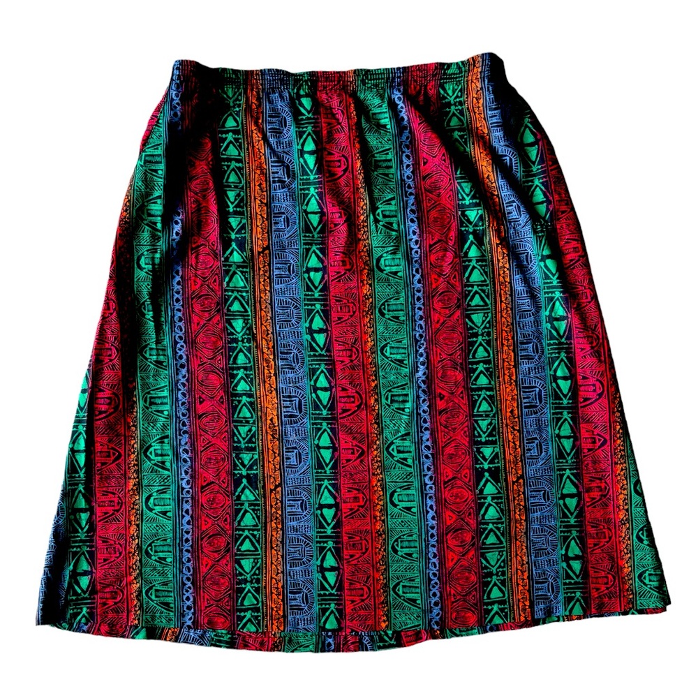 90s tiki skirt!
Size: 16 but can fit any size with belt.
Waist: up to 40’